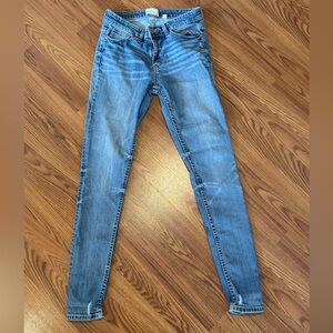 Buckle Payton Skinny Jeans with Stretch and Faded Details